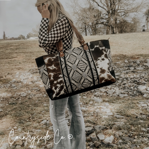 Bolso de fin de semana Charlene de piel de vaca ✈️🖤