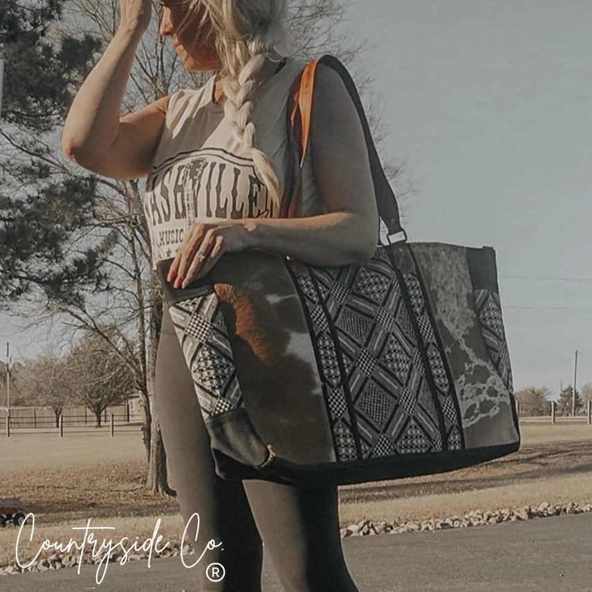 Bolso de fin de semana Charlene de piel de vaca ✈️🖤