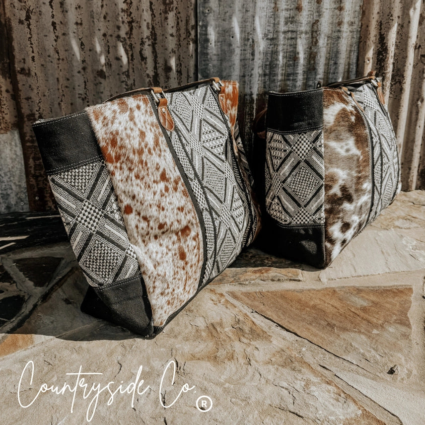 Bolso de fin de semana Charlene de piel de vaca ✈️🖤