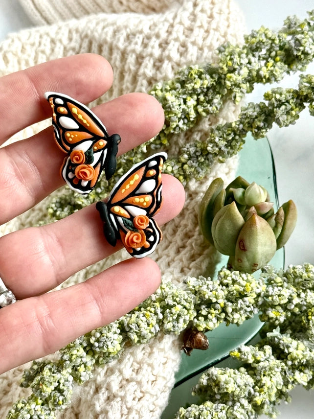 Monarch Majesty: Orange Floral Butterfly Earrings