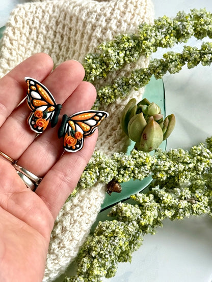Monarch Majesty: Orange Floral Butterfly Earrings