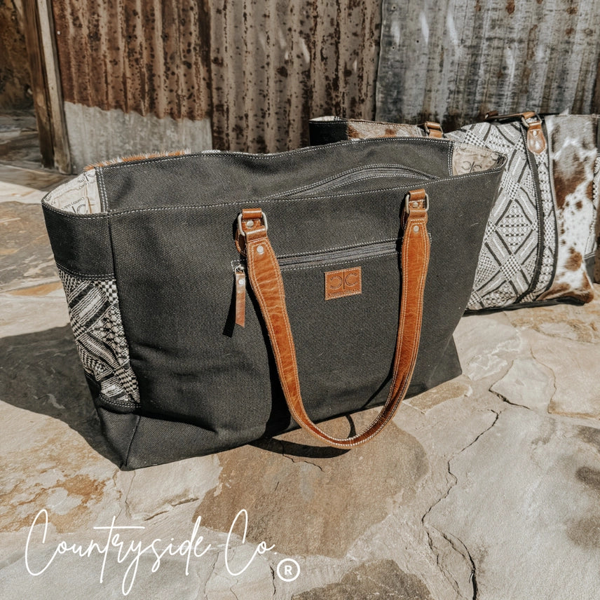 Bolso de fin de semana Charlene de piel de vaca ✈️🖤